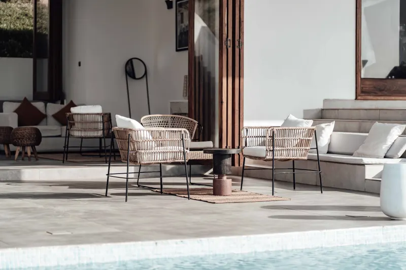 An elegant interior of a Cascais vs Estoril villa highlighting spacious living areas and modern design elements.