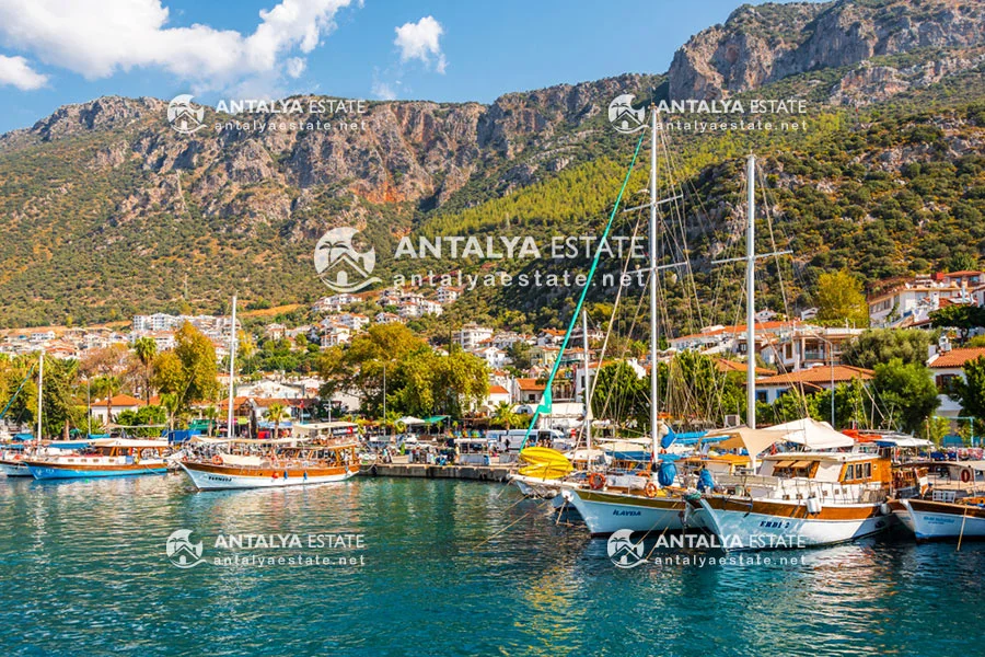 A beautiful view of boats and mountains in Kas, Antalya